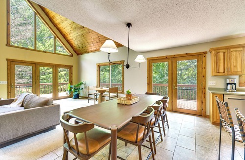 Amery House | NEW LISTING! Timber Ridge Lake House is a private lake home in Amery Wisconsin on Lake Wapogasset. The home balances the warmth of a large A-Frame with modern decor and finishes providing a serene stay with woods and lake views.