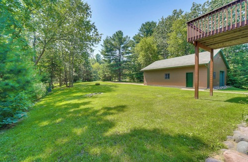 Amery House | NEW LISTING! Timber Ridge Lake House is a private lake home in Amery Wisconsin on Lake Wapogasset. The home balances the warmth of a large A-Frame with modern decor and finishes providing a serene stay with woods and lake views.