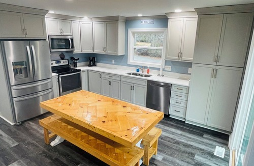 Littleton Cottage | NEW! Main lake Family-Friendly retreat with private dock, game room, & fire pit!