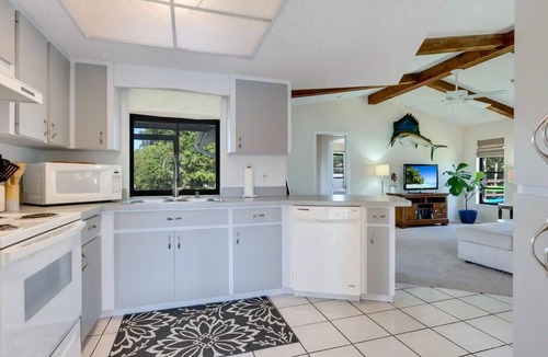 Nokomis Cottage | New Pool! - Tropical Waterfront Cottage -Dock & Optional Boat