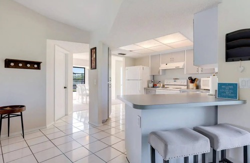 Nokomis Cottage | New Pool! - Tropical Waterfront Cottage -Dock & Optional Boat