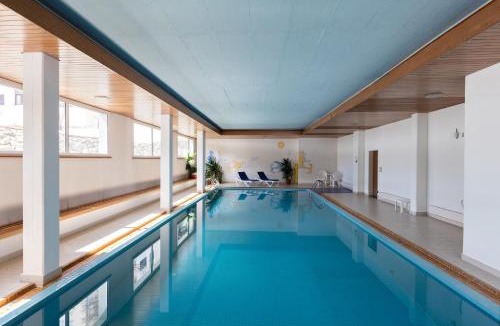 Champfer Apartment | New Premium Studio with eFireplace, Pool & Sauna