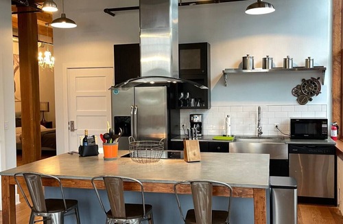 Downtown Rochester Apartment | NEW TO VRBO: Industrial History with a Modern Day Design Loft Apartment
