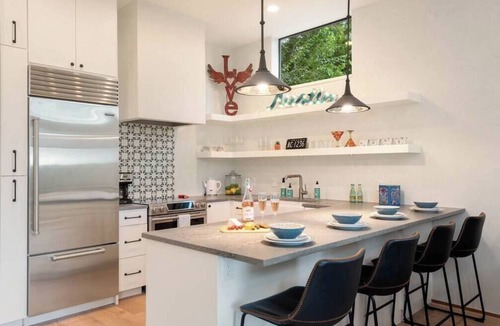 South River City House | NEW to VRBO - Modern Mediterranean Home with Rooftop Deck Views