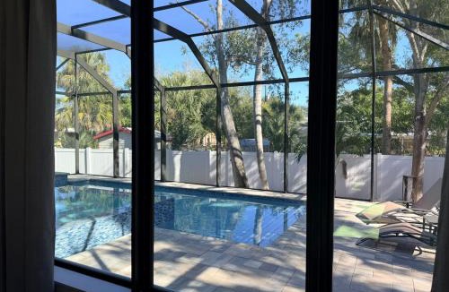 Downtown House | New Upscale & Modern Heated Pool Home in Walkable Downtown!