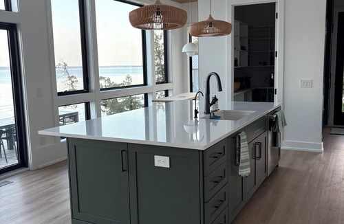 Suttons Bay House | New Waterfront Home with Private Beach