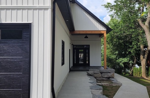 Peterborough House | Newly built, 6 bedroom, waterfront house with pool and hot tub.