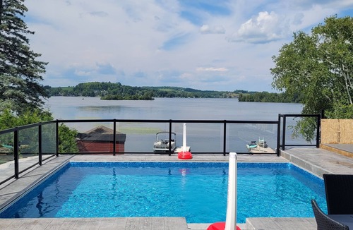 Peterborough House | Newly built, 6 bedroom, waterfront house with pool and hot tub.