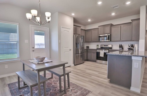 Wellborn House | Newly built home in south College Station with comfortable beds and free WiFi!