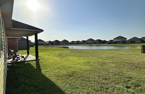 Carlyss House | Newly remodeled 2 story home with an amazing pond view!