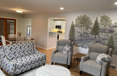 Des Moines House | Newly Remodeled Brick Home with wall Sculptures by the Airport