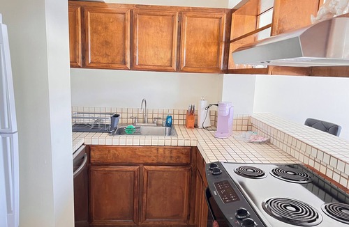 Hilo Apartment | Newly Remodeled ,Central Located , Mountain views, Elevators, Pool , And WiFi .