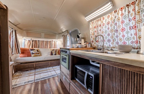 Spicewood House | Newly Renovated Camper with Fresh Decor and Tiny Deck in Texas