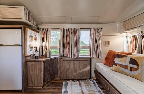 Spicewood House | Newly Renovated Camper with Fresh Decor and Tiny Deck in Texas
