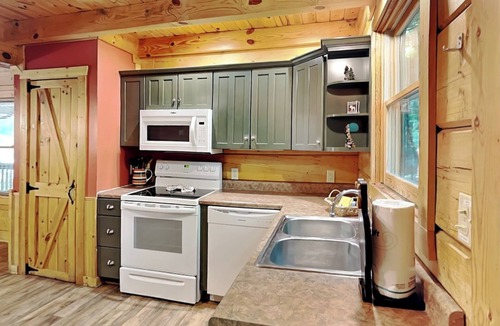 Chalet Village Cabin | Newly Updated Large Cabin with Game Room, Hot Tub + More!