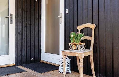 Sklskr House | Nice and bright cottage with a kitchen that is partly open to the dining and living room.