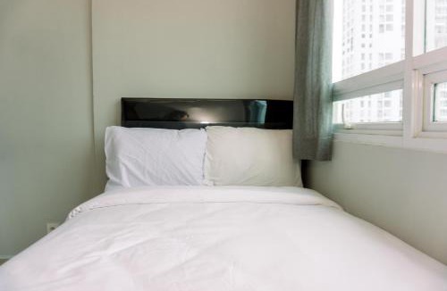 Old Jakarta Apartment | Nice and Elegant 2BR Apartment at Springhill Terrace Residence By Travelio