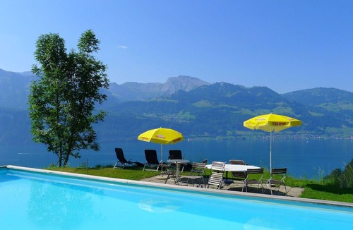 Gersau Apartment | Nice apartment for 2 guests with WIFI, pool, TV, balcony and parking