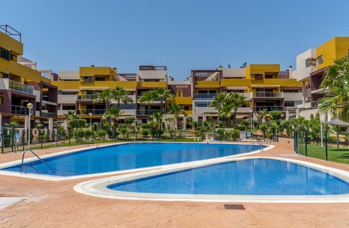 Flamenca Beach Apartment | Nice apartment for 4 guests with A/C, pool, WIFI, TV, terrace and pets allowed