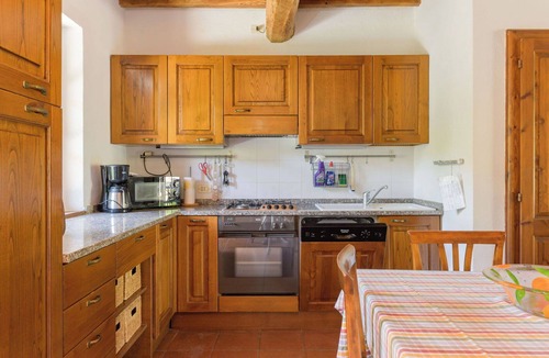 Giuncarico Apartment | Nice apartment for 4 guests with WIFI, TV, patio, pets allowed and panoramic view