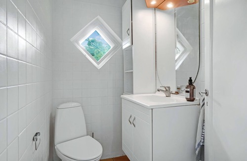 Rrvig House | Nice cottage with wood stove and idyllic garden, close to wonderful sandy beach.