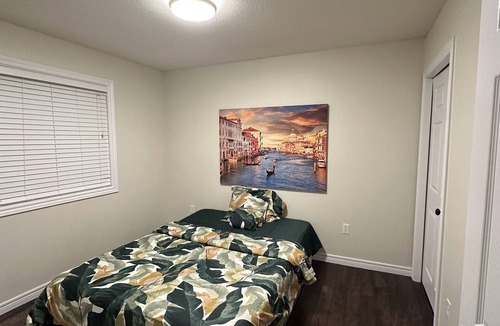 Grand River South House | Nice home with cozy living room, large backyard, bedroom and bathroom.