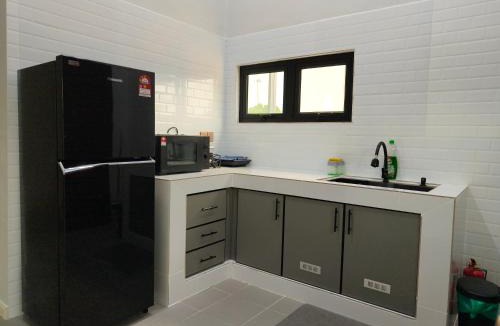 Kampung Penarik House | NitaDinn Guest House