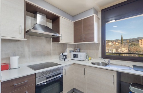 Olvan Apartment | Niu Turistic Olvan Apartment with Mountain Views, Balcony, and Air Conditioning