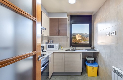 Olvan Apartment | Niu Turistic Olvan Apartment with Mountain Views, Balcony, and Air Conditioning