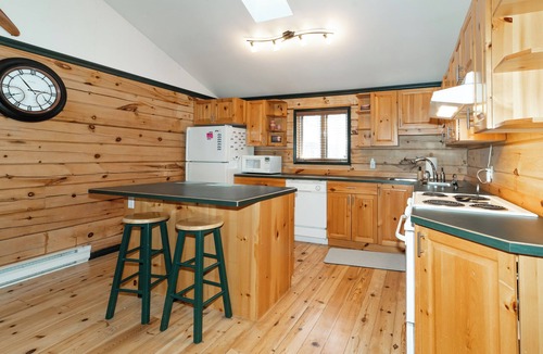 Algonquin Highlands Cottage | nKawagama Shoreline | Quiet Log Cottage on Kawagama with wood-burning fireplaces