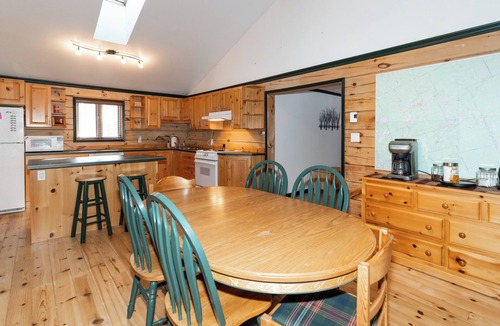 Algonquin Highlands Cottage | nKawagama Shoreline | Quiet Log Cottage on Kawagama with wood-burning fireplaces
