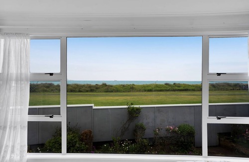 Rewa House | No.1 Beachfront holiday home. Steps to sand