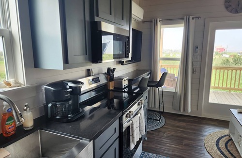Gilchrist Cabin | No Egrets- Beach & Bay Views, Steps from Beach