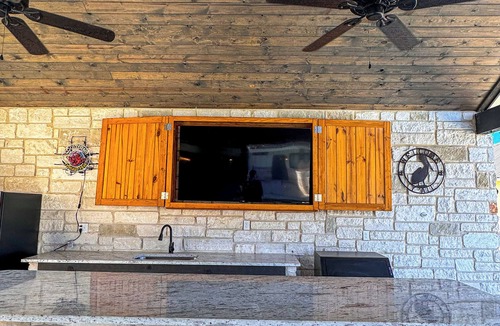 Sabinal House | NOLA styled 6-bedroom home in Concan. Sleeps 36 with AC, WiFi, Pool, Hot Tub
