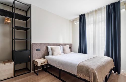Les Philosophes Apartment | Nonanteneuf appart hōtel Genève Plainpalais - contactless check-in