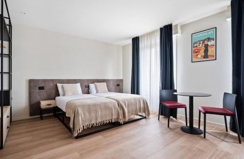 Les Philosophes Apartment | Nonanteneuf appart hōtel Genève Plainpalais - contactless check-in