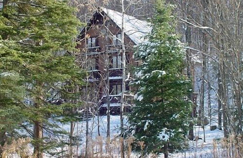 Stambaugh Ski Chalet | Nordic Haus chalet nestled in the serene woods of Ski Brule Village