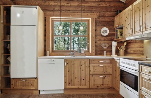 Øster Melholt House | Nordic log cabin with views over the fields