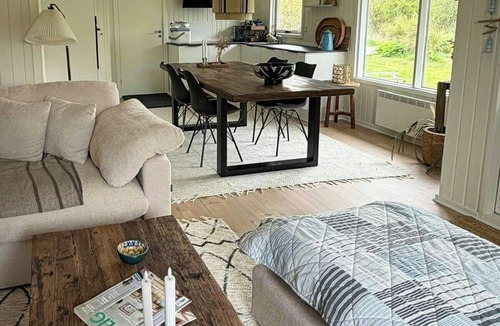 Ulfborg House | Nordic log house between sea and fjord