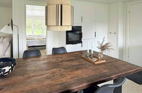 Ulfborg House | Nordic log house between sea and fjord