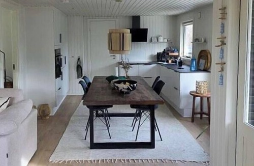 Ulfborg House | Nordic log house between sea and fjord