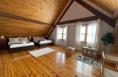 Fort Coulonge Ski Chalet | Nordic Log Retreat - Chalet on the River