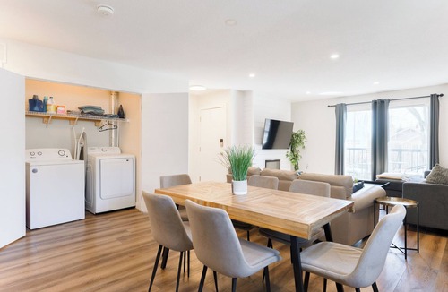 Crescent Heights Apartment | Nordic SPA Retreat, Hot Tub, Sleeps 8, Near Downtown and 15 min to the Airport!