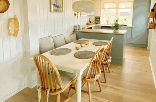 Skastrup Strand House | North Funen summer house with view and style