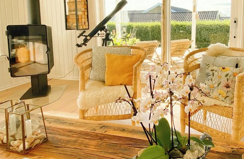 Skastrup Strand House | North Funen summer house with view and style