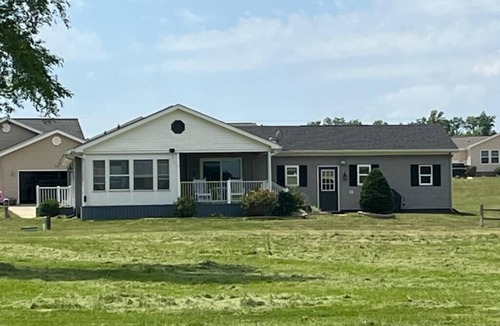 Coldwater House | North Lakes chain waterfront home with private dock access.