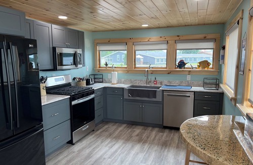 Sandy Creek House | North Sandy Pond Lakehouse with dock and hot tub