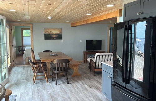 Sandy Creek House | North Sandy Pond Lakehouse with dock and hot tub