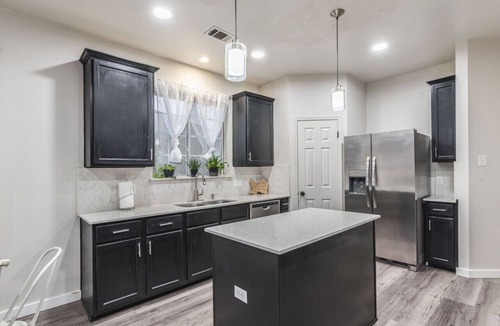 Pflugerville House | NorthATX Urban Oasis Pool 5BR 2BA Game room Office