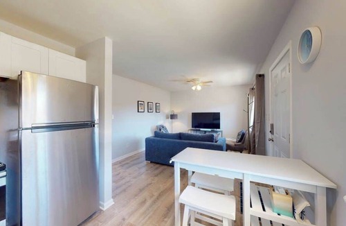 Caine Woods Condo | Northside condo near the beach with private balcony, full kitchen, AC, & W/D